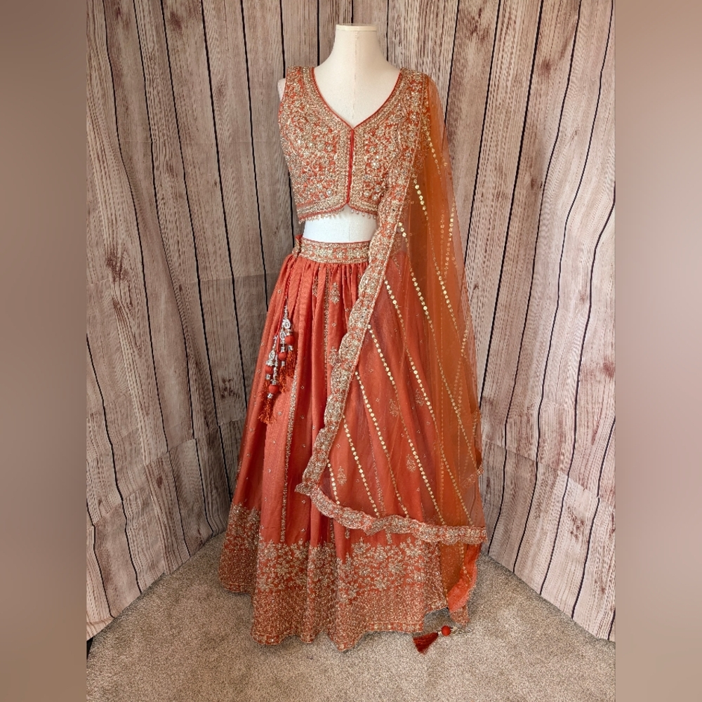 Rust Orange And Gold Embellished Lehenga Choli Set